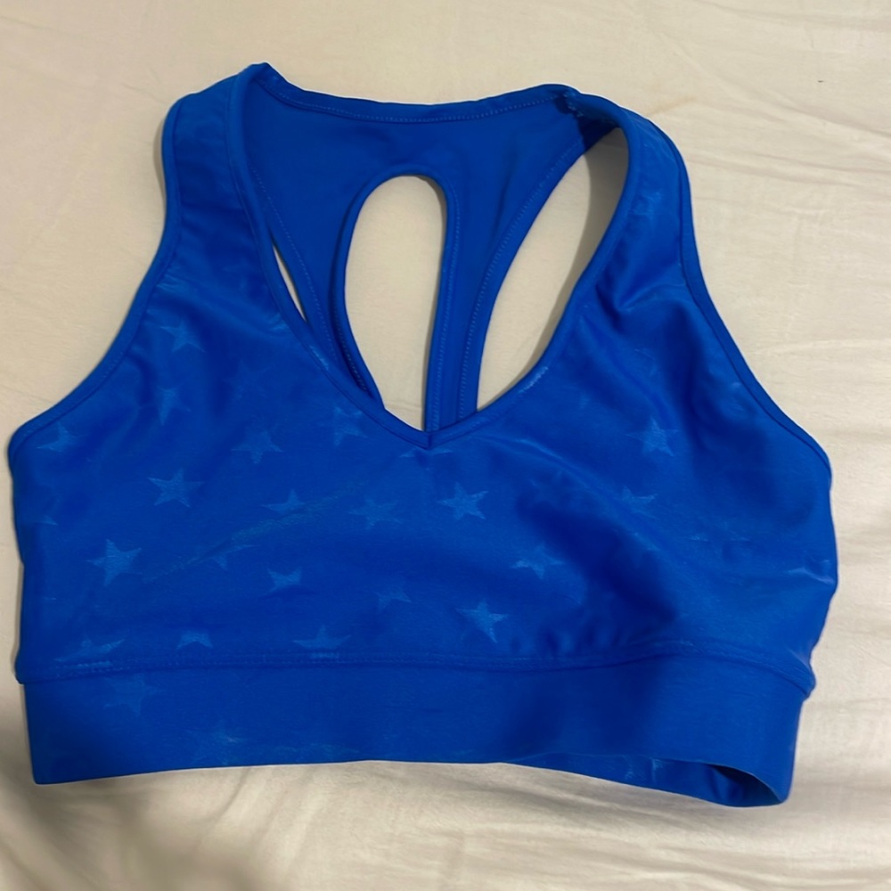 Carbon38 action takara bra blue with stars 
size XS